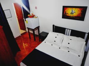 Postel nebo postele na pokoji v ubytování Hotel Casa Sarita