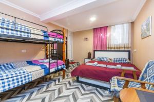 Postel nebo postele na pokoji v ubytování Guest house poligloti
