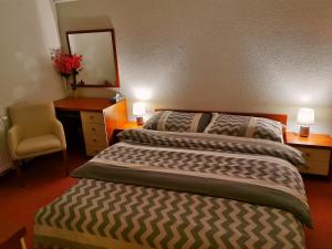 Katil atau katil-katil dalam bilik di Luxusný Dom Donovaly