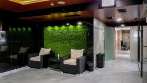 A seating area at Apartment Luna Hrebienok C109