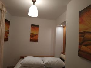 Posteľ alebo postele v izbe v ubytovaní Apartament ZOYA + garaż