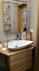 Kúpeľňa v ubytovaní Apartament Hawrań Murzasichle Apartamenty Murzasichle PL