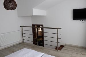 Posteľ alebo postele v izbe v ubytovaní Apartmán Olaf Tatranská Lomnica