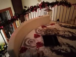 Postel nebo postele na pokoji v ubytování B&b De Mauro