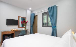 TV a/nebo společenská místnost v ubytování PIANO HOTEL