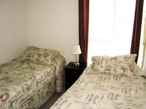 Ένα ή περισσότερα κρεβάτια σε δωμάτιο στο Vista Chinchorro