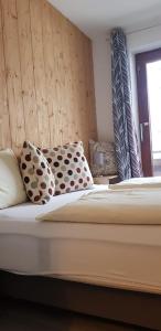 מיטה או מיטות בחדר ב-Casa Alpina Relax - include Jokercard - only summer
