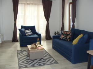 O zonă de relaxare la Panorama Apartman - Milmari L47