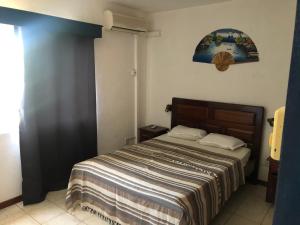 Postel nebo postele na pokoji v ubytování Dreamland Apartment No3 Azur Beach Complex PEREYBERE