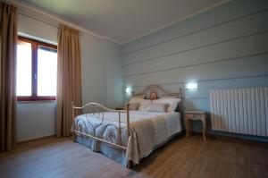 Katil atau katil-katil dalam bilik di Agriturismo La Madonnina +42 gambar
