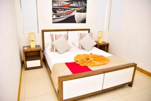 Postel nebo postele na pokoji v ubytování Cap Ouest Beachfront Residences