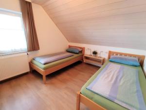 Postel nebo postele na pokoji v ubytování BodenSEE Haus am Geissbock
