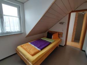 Postel nebo postele na pokoji v ubytování BodenSEE Haus am Geissbock