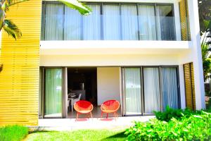 Posezení v ubytování Cap Ouest Beachfront Residences