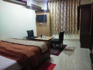 Hotel Nature's View客房内的一张或多张床位