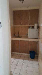 Η κουζίνα ή μικρή κουζίνα στο CmK STUDIO APARTMEN KTC#Netflix