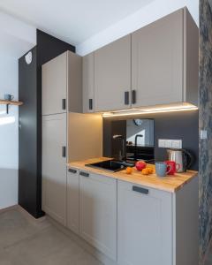 Kuchyňa alebo kuchynka v ubytovaní P&O Apartments Służewiec