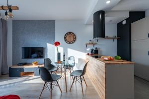 Kuchyňa alebo kuchynka v ubytovaní P&O Apartments Służewiec