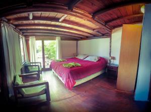 En eller flere senger på et rom på Casabosque Apartamentos