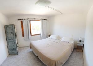 Una cama o camas en una habitación de Casabosque Apartamentos