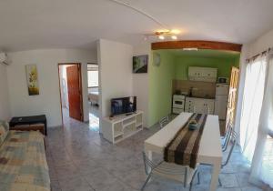 Una televisión o centro de entretenimiento en Casabosque Apartamentos