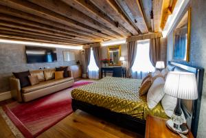 Postel nebo postele na pokoji v ubytování EGO' Residence Venice