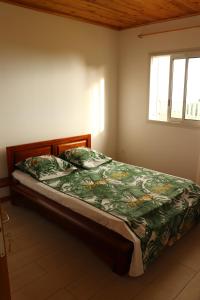 Posteľ alebo postele v izbe v ubytovaní Gîte des Dodos