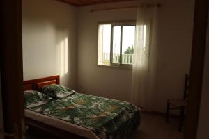 Postel nebo postele na pokoji v ubytování Gîte des Dodos