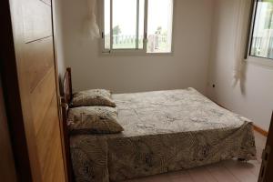 Postel nebo postele na pokoji v ubytování Gîte des Dodos