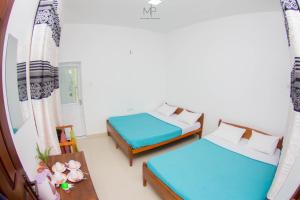 Voodi või voodid majutusasutuse Tea Breeze Motel toas