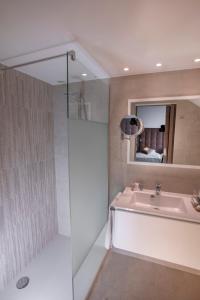 Ванная комната в Hotel Atlanta Knokke