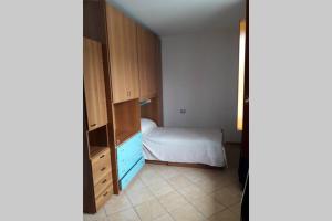 Postel nebo postele na pokoji v ubytování Appartamento sul lago d'Iseo