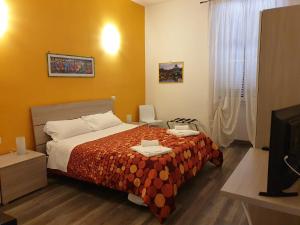 Televisyen dan/atau pusat hiburan di Holidays in Rome - Guesthouse