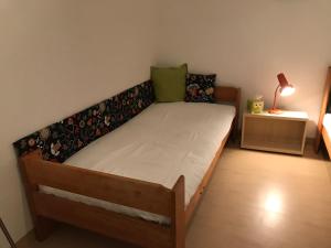 Ένα ή περισσότερα κρεβάτια σε δωμάτιο στο Haus LUNA - Privatzimmer im sonnigen Südburgenland
