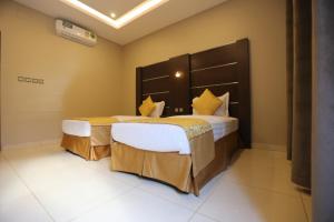 Ένα ή περισσότερα κρεβάτια σε δωμάτιο στο Manazel Aldana