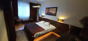 Un pat sau paturi într-o cameră la Villa Onix