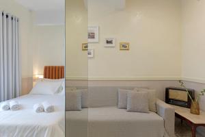 Posteľ alebo postele v izbe v ubytovaní Athenian Lofts