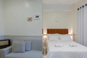 Posteľ alebo postele v izbe v ubytovaní Athenian Lofts