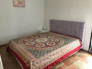 A bed or beds in a room at Li Frati Biancheddi