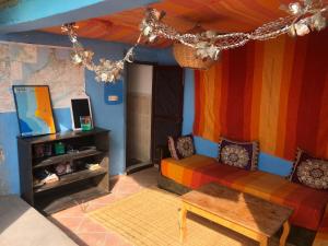 A seating area at Surf and Skate hostel taghazout