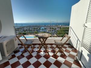 a balcony with a table and chairs and a view at Son Veri D'Abaix in El Arenal
