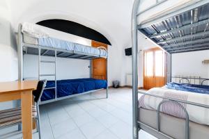 Posteľ alebo postele v izbe v ubytovaní Albergue las Veletas