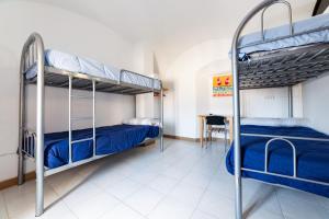 Posteľ alebo postele v izbe v ubytovaní Albergue las Veletas