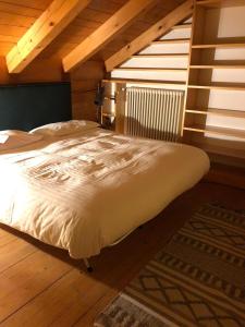 En eller flere senger på et rom på Cavalese luxury mountain and sky