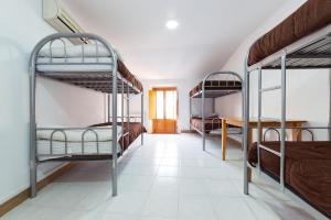 Posteľ alebo postele v izbe v ubytovaní Albergue las Veletas