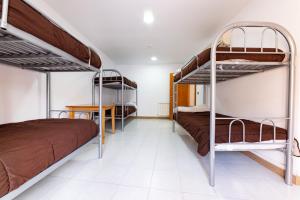 Poschodová posteľ alebo postele v izbe v ubytovaní Albergue las Veletas