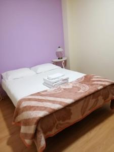 Katil atau katil-katil dalam bilik di Olinda Home +22 gambar