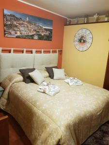Postel nebo postele na pokoji v ubytování Sassi's Loft