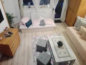 A bed or beds in a room at Privat Gazda Pension