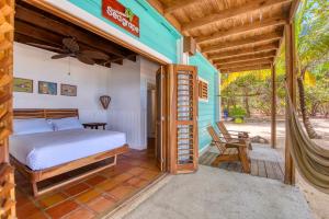 Letto o letti in una camera di Camp Bay Lodge